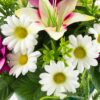 GiftsAfterLife Faux Daisy Potted Faux Flower arrangement.